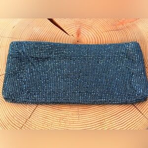 Christian Louboutin Clutch
Sparkle everywhere you go!
Very Good
High-end